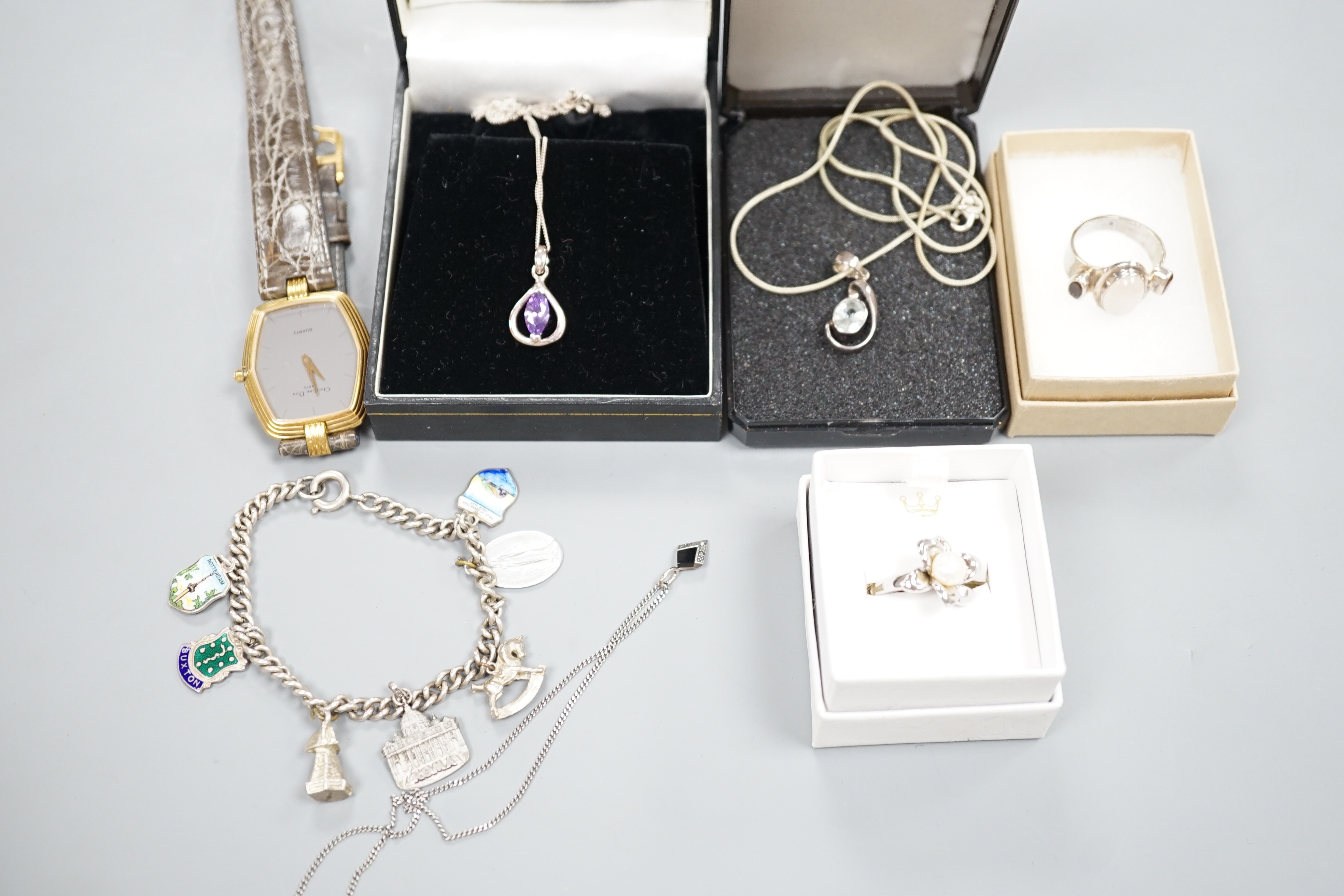 A small quantity of modern 925 and gem set jewellery and a Christian Dior quartz wrist watch.